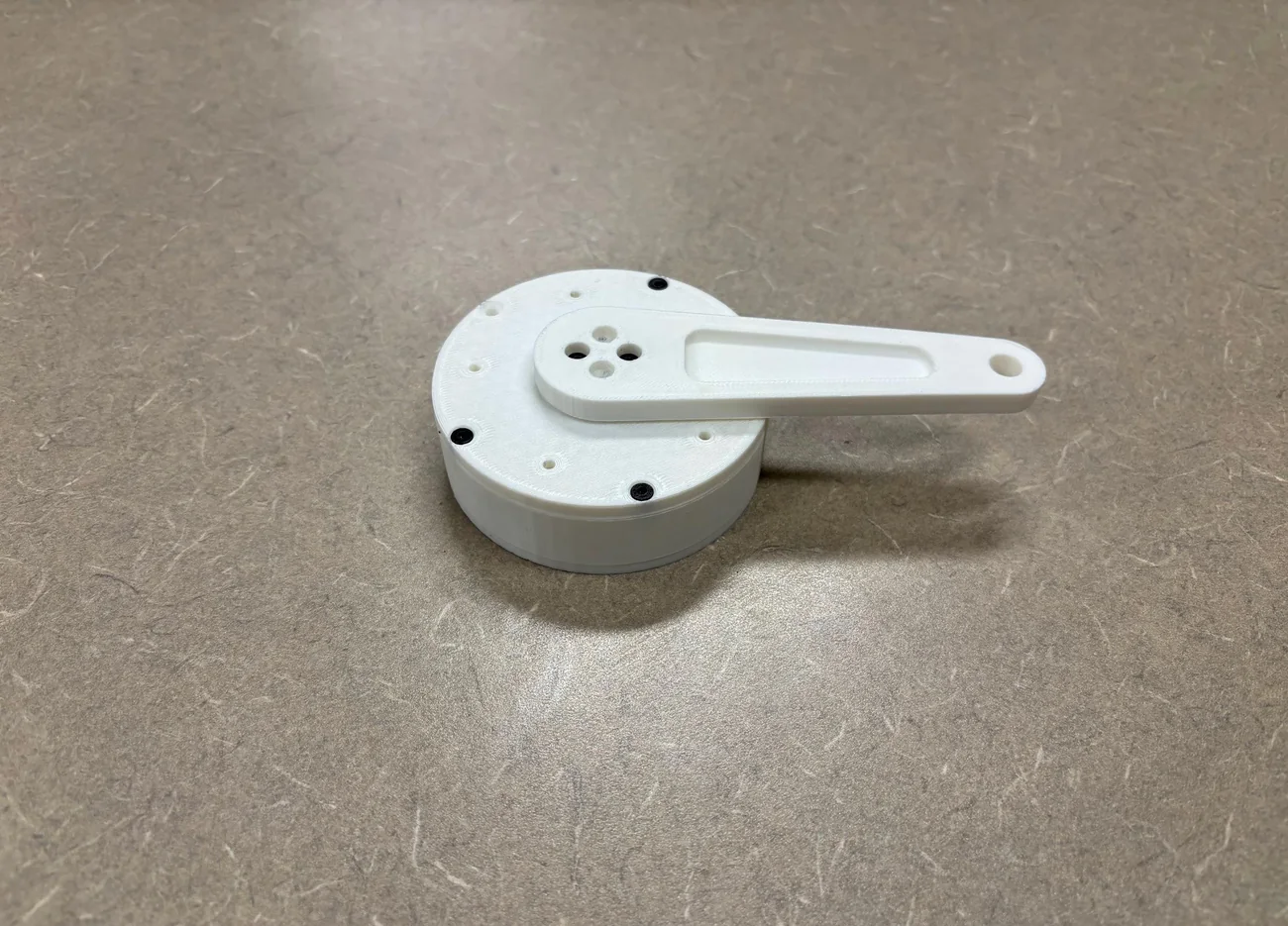 Top view of the assembled cycloidal gearbox showing its low profile